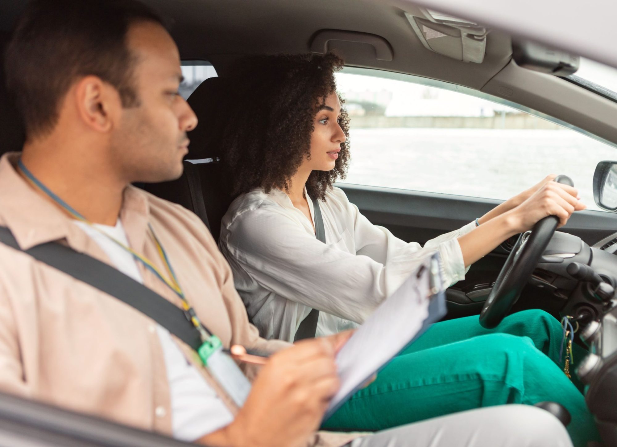 arabic-instructor-man-conducting-driving-test-for-2026-01-08-23-04-20-utc